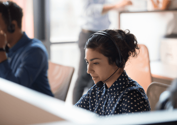 people answering calls in a call center